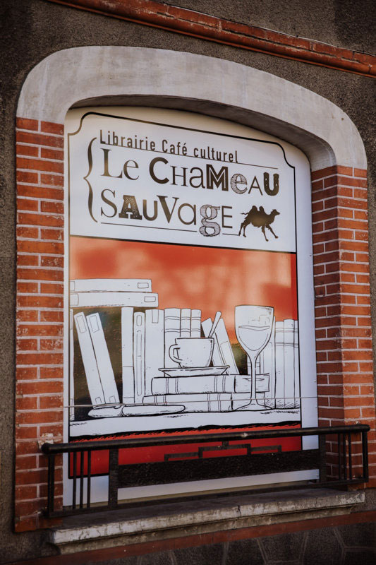 Enseigne Librairie Café culturel Le Chameau sauvage